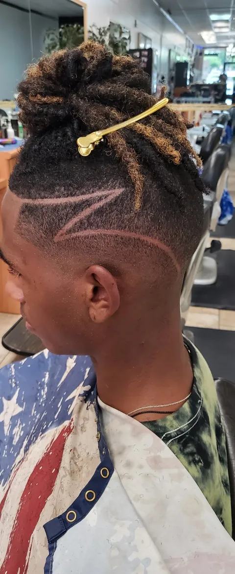 Locs and shaved side design